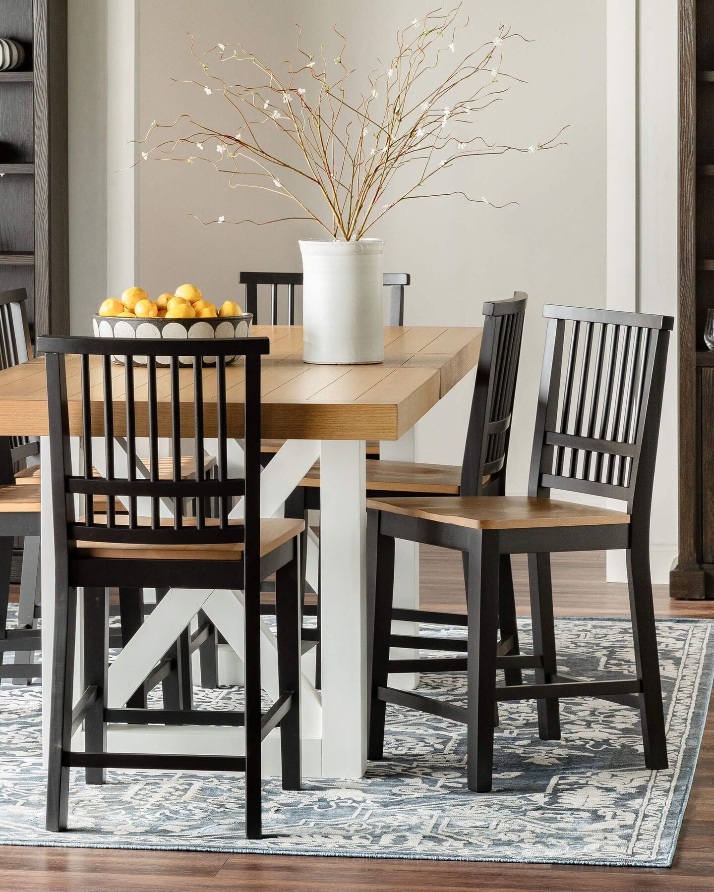 Warm inviting dining room with farmhouse-style dining set