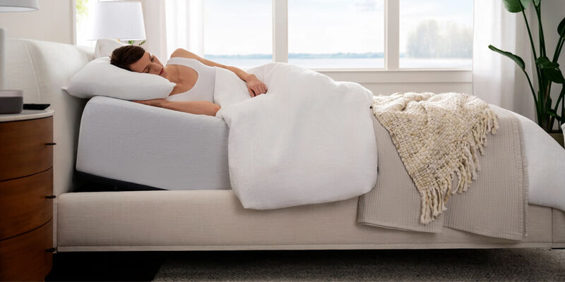 Woman sleeping on Purple Mattress and Pillow